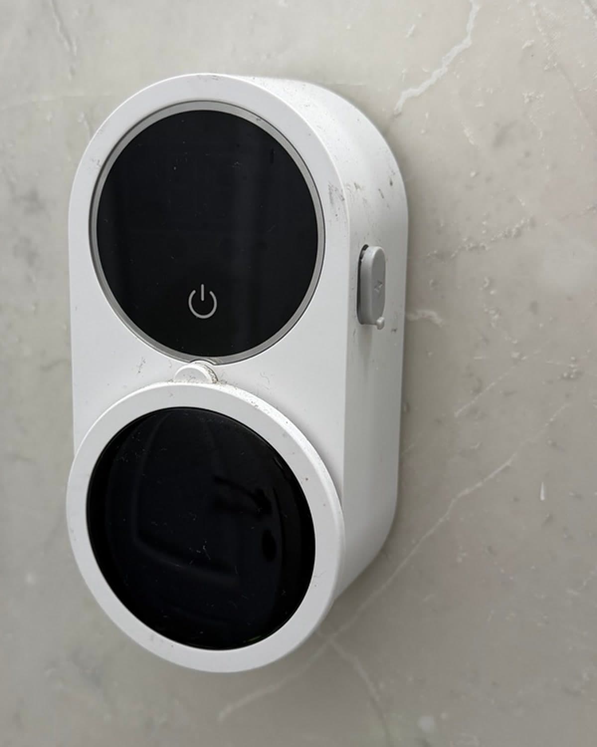 Paragon Cove mounted on a bathroom wall with the rotating cover closed, photographed at home